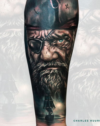 Detailed black and grey tattoo art by Charles Huurman