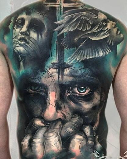 Detailed back piece being inked by a skilled tattooist